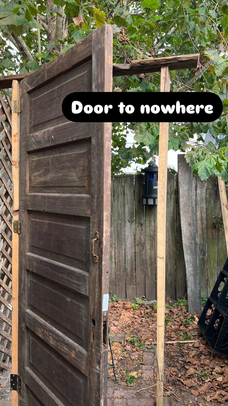 Detail of the doorframe construction with reclaimed siding